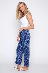 Le pantalon à motif pois bleus et blancs