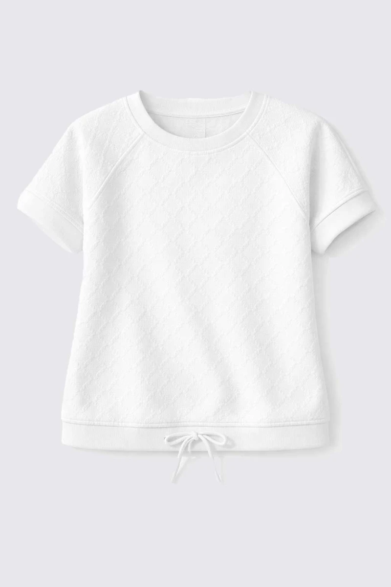 Le haut à ourlet cordon en maille losange