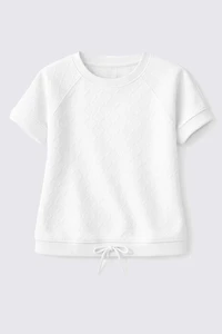 Le haut à ourlet cordon en maille losange