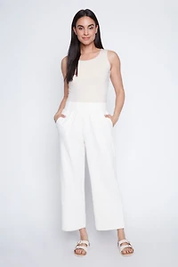 Le pantalon à jambe large en maille losanges