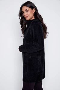 Le manteau-cardigan à cils