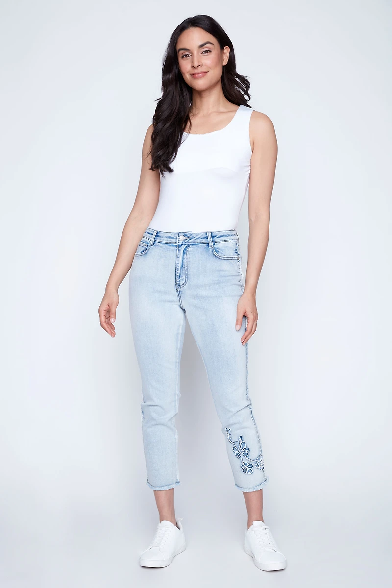 Slim leg embroidered hem jean
