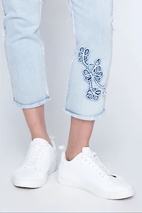 Slim leg embroidered hem jean