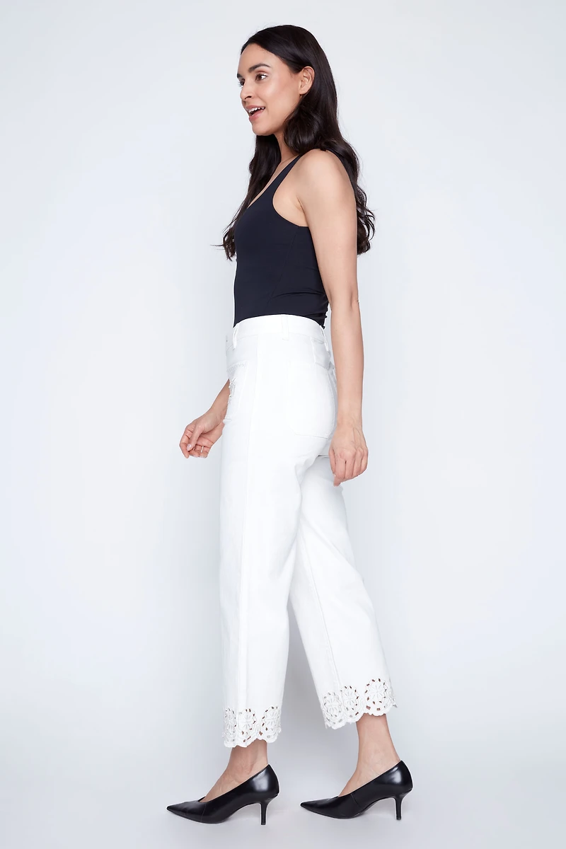 Flare leg eyelet embroidery hem jean