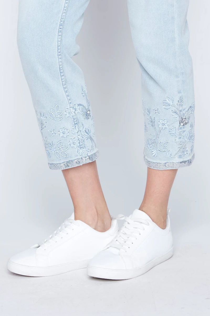 Slim leg embroidered hem jean