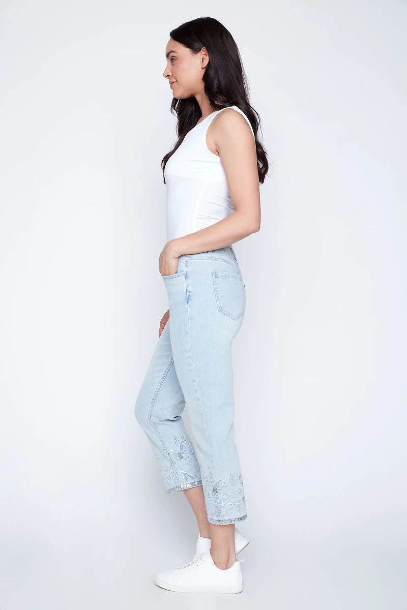 Slim leg embroidered hem jean