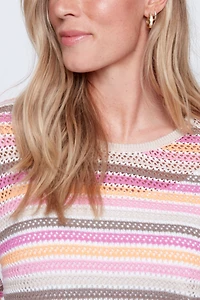 Le haut en coton rayé avec ourlet à cordon de serrage