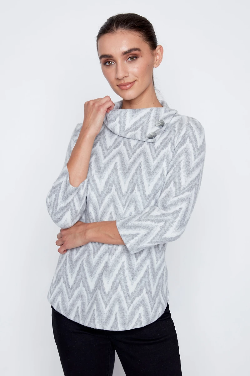 Split neck jacquard knit top