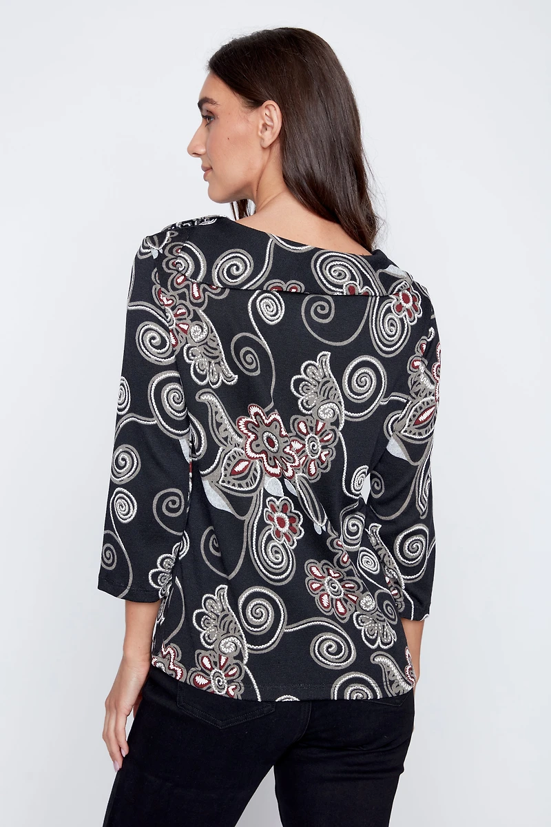 Le haut en tricot à imprimé bouffant