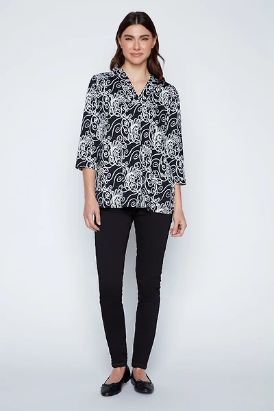 Le haut à imprimé fleuri bouffant