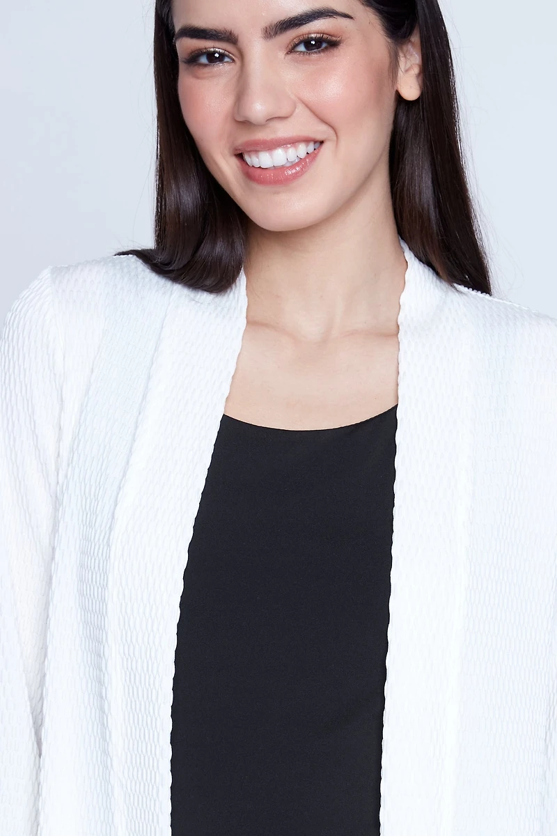 Le cardigan texturé avec poches