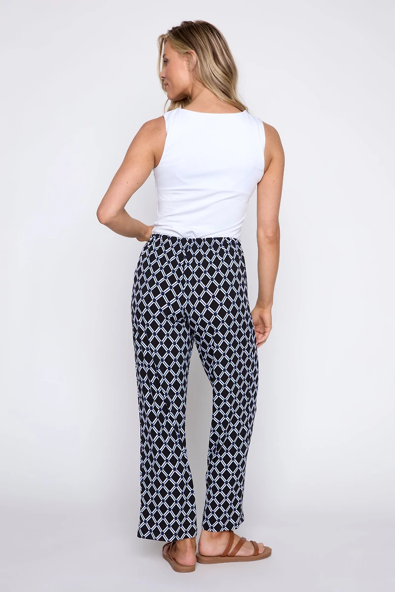 Le pantalon à motif pois bleus et blancs