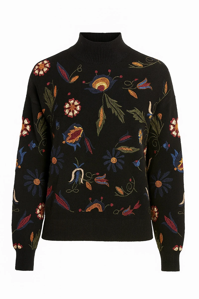 Le pull brodé de feuilles florales