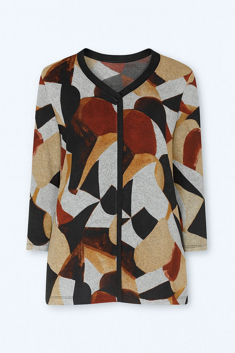 Le haut en tricot à motif abstrait