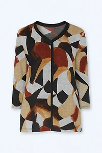 Le haut en tricot à motif abstrait
