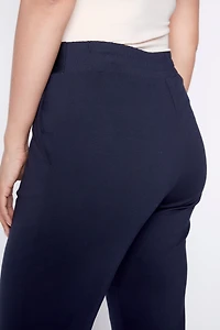 Le pantalon à revers uni