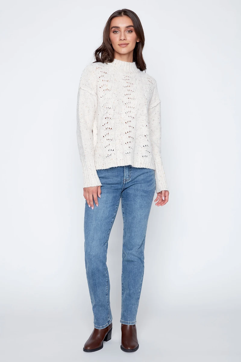 Le pull à manches bouffantes