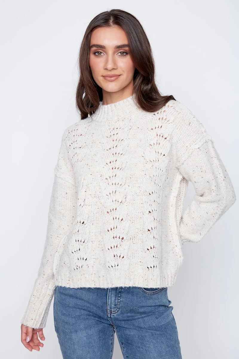 Le pull à manches bouffantes