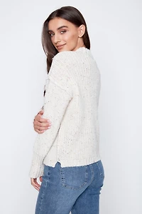 Le pull à manches bouffantes