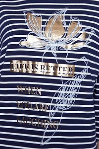 Le haut rayé à manches dolman