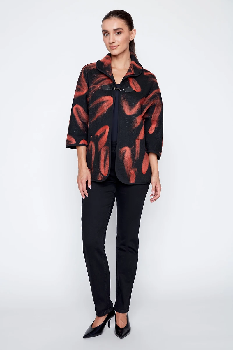 La veste en maille jacquard floconnée