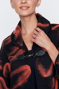 La veste en maille jacquard floconnée
