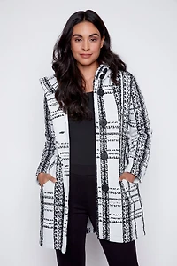 Le manteau à carreaux capuche