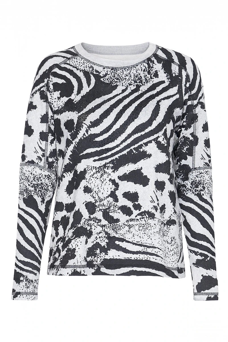 Le haut à imprimé animalier avec ourlet asymétrique
