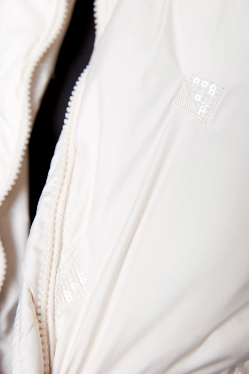 Le gilet matelassé à paillettes