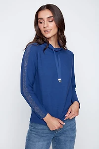 Le pull en coton avec détails strass