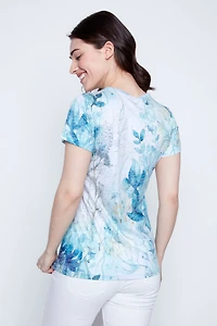 Le T-shirt à imprimé floral aqua dévoré