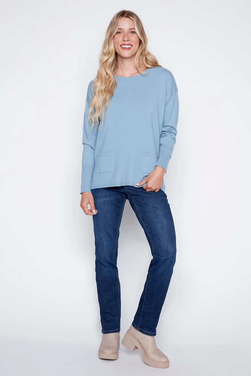 le pull avec détails de boutons colorés dans dos