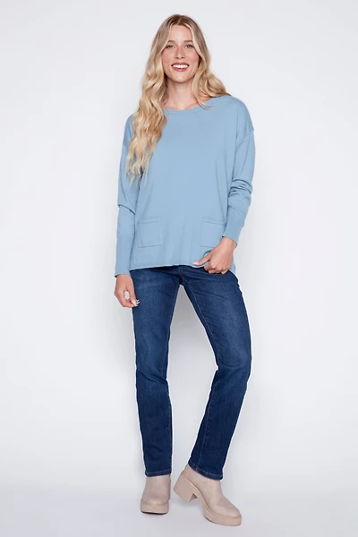 le pull avec détails de boutons colorés dans dos