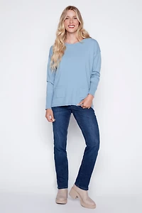 le pull avec détails de boutons colorés dans dos