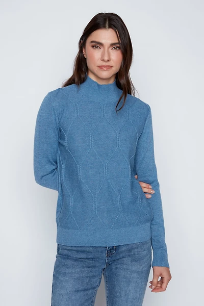 Le pull en coton mélangé à torsades géométriques