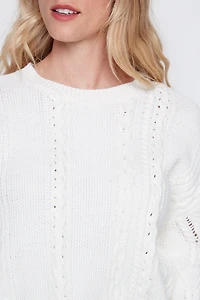 Le pull en maille torsadée