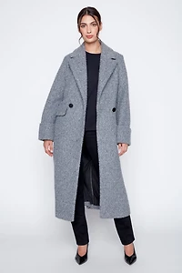 Le manteau bouclé double boutonnage