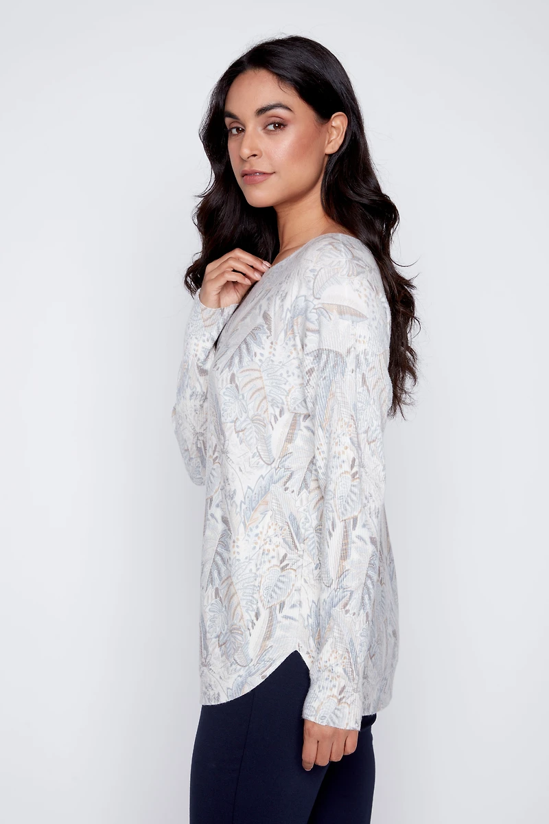 Le pull imprimé feuillage
