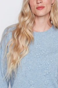 Le pull brodé de fleurs ton sur