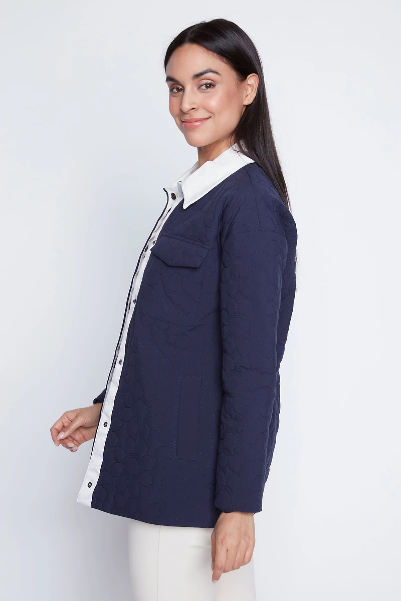 La veste matelassée à broderies florales