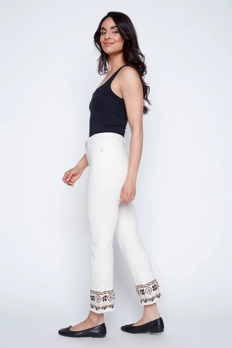 Flare leg with embroidered hem jean