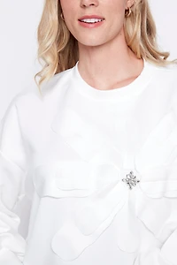 Le pull fleuri avec appliques diamantées