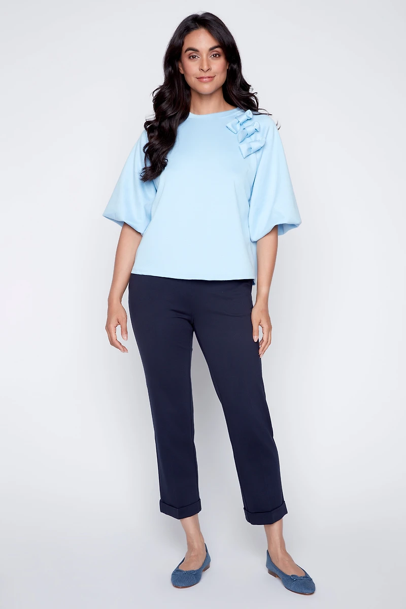 Puff sleeve top with bow detail