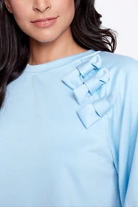 Puff sleeve top with bow detail