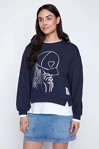 Le haut à motif fille avec casquette