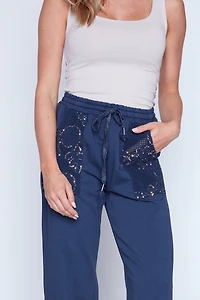 Le pantalon palazzo à poches en crochet