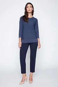 le pull uni avec détails surpiqués sur devant