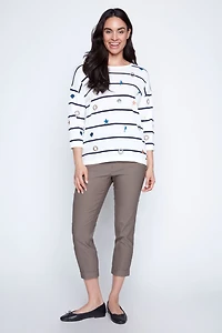 Le pull à motif monde marin