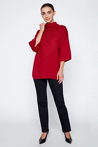 Le pull avec détails de cœur