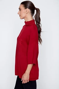 Le pull avec détails de cœur